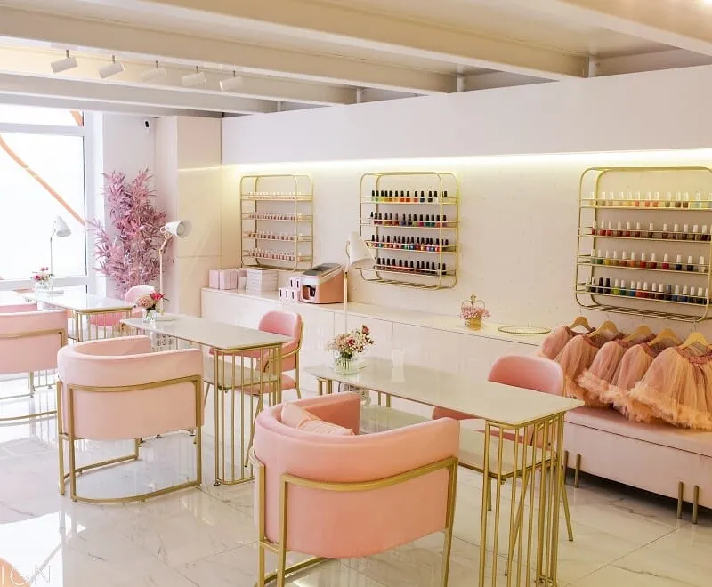 Modern salon interior with pink chairs